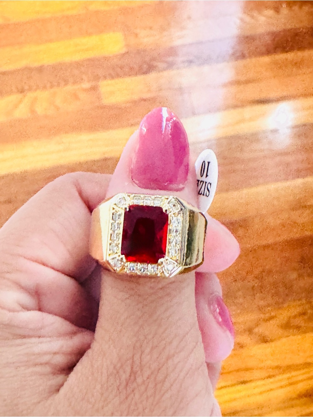 18K Gold-Plated men’s Ring with Deep Red Center Stone and Crystal Halo. New